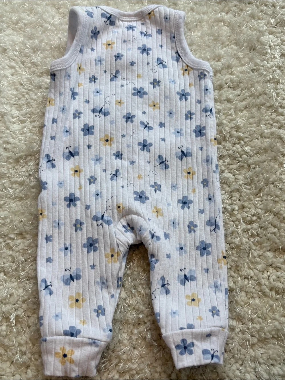 Willow+Whimsey Sleeveless Ribbed One-Piece Bodysuit in White with Blue Floral